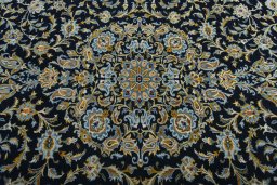 Central medallion detail of 2000s Kashan rug from Iran / Persia