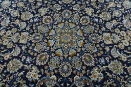 Central medallion detail of 2000s Kashan rug from Iran / Persia