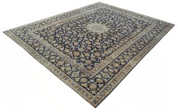 Corner detail of 1970s Kashan rug showing border pattern and Wool pile