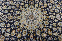 Central medallion detail of 1970s Kashan rug from Iran / Persia