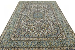 Surface texture of 2000s Kashan rug with natural Wool and intricate pattern