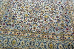 Close-up detail of 2000s Kashan rug from Iran / Persia showing Wool weave