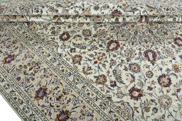 Close-up detail of 2000s Kashan rug from Iran / Persia showing Wool weave