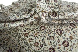 Surface texture of 2000s Kashan rug with natural Wool and intricate pattern
