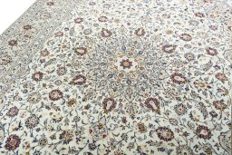 Backside of handmade 2000s Kashan rug showing knot structure and weave density