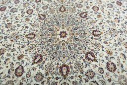 Central medallion detail of 2000s Kashan rug from Iran / Persia