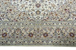 Full view of 2000s Kashan rug from Iran / Persia, 396 × 287 cm in Beige tones