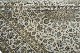 Close-up detail of 2000s Kashan rug from Iran / Persia showing Wool weave