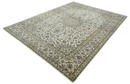 Corner detail of 2000s Kashan rug showing border pattern and Wool pile