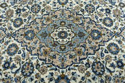 Central medallion detail of 2000s Kashan rug from Iran / Persia