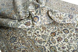 Surface texture of 2000s Kashan rug with natural Wool and intricate pattern