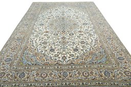 Surface texture of 2000s Kashan rug with natural Wool and intricate pattern