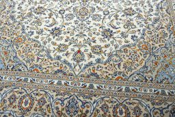 Close-up detail of 2000s Kashan rug from Iran / Persia showing Wool weave