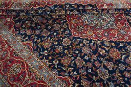 Close-up detail of 2000s Kashan rug from Iran / Persia showing Cork weave