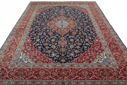 Surface texture of 2000s Kashan rug with natural Cork and intricate pattern