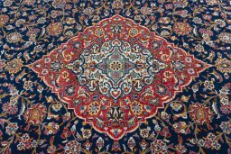 Central medallion detail of 2000s Kashan rug from Iran / Persia