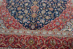 Close-up detail of 2000s Kashan rug from Iran / Persia showing Cork weave