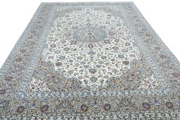 Surface texture of 2000s Kashan rug with natural Wool and intricate pattern