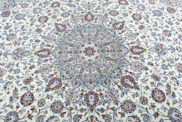 Central medallion detail of 2000s Kashan rug from Iran / Persia