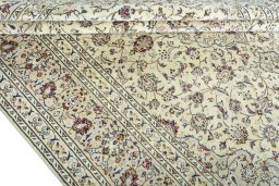 Close-up detail of 2000s Kashan rug from Iran / Persia showing Wool weave