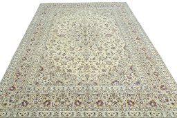 Surface texture of 2000s Kashan rug with natural Wool and intricate pattern