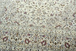 Close-up detail of 2000s Kashan rug from Iran / Persia showing Wool weave