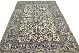 Surface texture of 2000s Kashan rug with natural Wool and intricate pattern