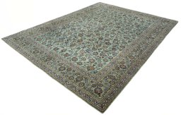 Corner detail of 2000s Kashan rug showing border pattern and Wool pile