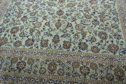 Close-up detail of 2000s Kashan rug from Iran / Persia showing Wool weave