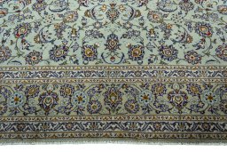 Full view of 2000s Kashan rug from Iran / Persia, 401 × 302 cm in Green tones