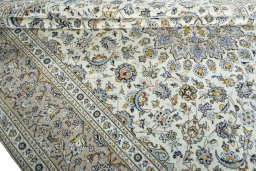 Close-up detail of 2000s Kashan rug from Iran / Persia showing Wool weave