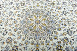 Central medallion detail of 2000s Kashan rug from Iran / Persia