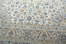Close-up detail of 2000s Kashan rug from Iran / Persia showing Wool weave