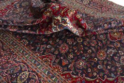 Surface texture of 2000s Kashan rug with natural Wool and intricate pattern