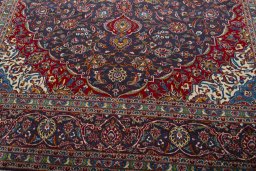 Close-up detail of 2000s Kashan rug from Iran / Persia showing Wool weave