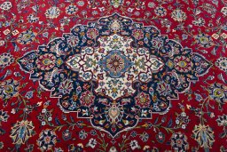 Central medallion detail of 2000s Kashan rug from Iran / Persia