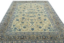Surface texture of 2000s Kashan rug with natural Wool and intricate pattern