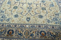 Close-up detail of 2000s Kashan rug from Iran / Persia showing Wool weave
