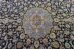 Central medallion detail of 2000s Kashan rug from Iran / Persia