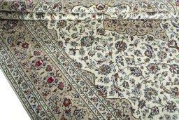 Close-up detail of 2000s Kashan rug from Iran / Persia showing Wool weave