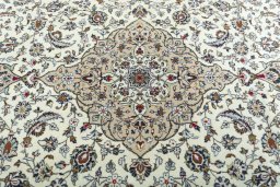 Central medallion detail of 2000s Kashan rug from Iran / Persia