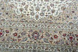 Close-up detail of 2000s Kashan rug from Iran / Persia showing Wool weave
