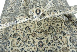 Central medallion detail of 2000s Kashan rug from Iran / Persia
