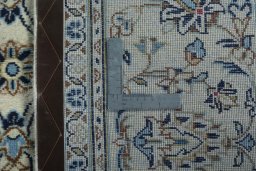 Close-up detail of 2000s Kashan rug from Iran / Persia showing Wool weave