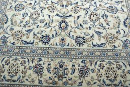 Full view of 2000s Kashan rug from Iran / Persia, 300 × 194 cm in Beige tones