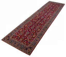 Corner detail of 2000s Kashan rug showing border pattern and Wool pile