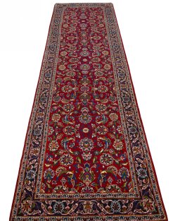 Surface texture of 2000s Kashan rug with natural Wool and intricate pattern