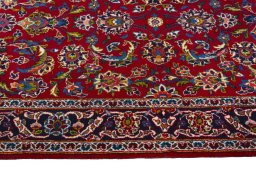 Close-up detail of 2000s Kashan rug from Iran / Persia showing Wool weave