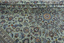 Close-up detail of 2000s Kashan rug from Iran / Persia showing Wool weave