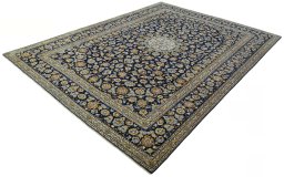 Corner detail of 2000s Kashan rug showing border pattern and Wool pile